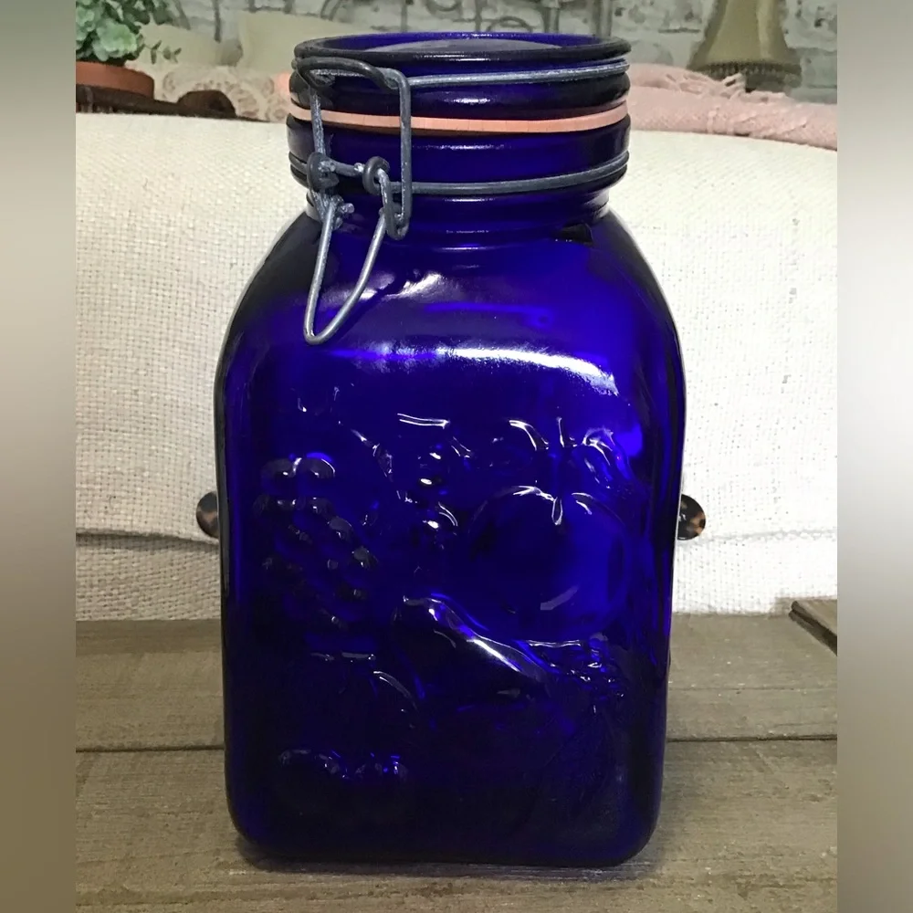 Vintage Farm Products Cobalt Blue tilt head canister w/metal closure.made ltaly
